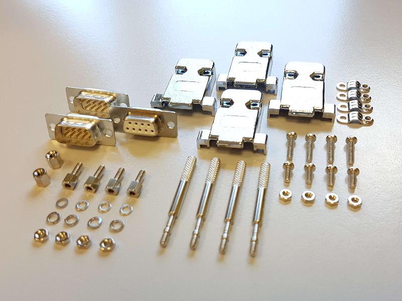 D-SUB Set 9-pins 8-pieces long fastening srews, 2x D-Sub housing, metallised plastic, 2x fastening screws UNC4/40 thread, 1x distance bolts UNC4/40 thread, 2x D-Sub pin header, gold plated contacts, with solder bucket, 1x D-Sub socket connector, gold plated contacts, with solder bucket
